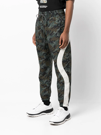 Shop Mostly Heard Rarely Seen Camouflage-print Track Pants In Green