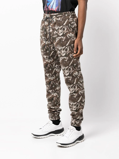 Shop Mostly Heard Rarely Seen Camouflage Jacquard Track Pants In Brown