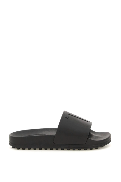 Shop Tod's Monogram Rubber Slides In Black