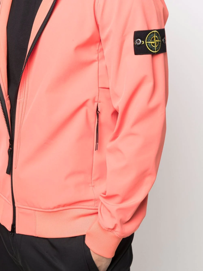 Shop Stone Island Logo-patch Zip-fastening Jacket In Orange