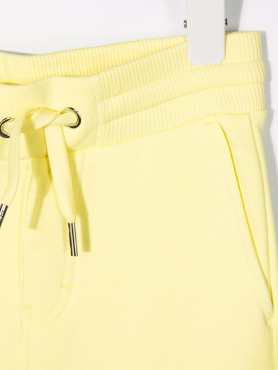 Shop Givenchy Logo-print Drawstring Jersey Shorts In Yellow