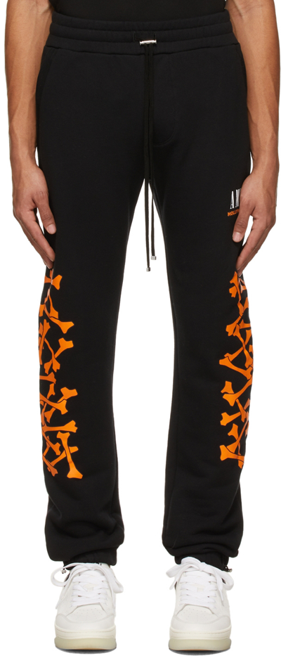 Shop Amiri Black & Orange Bones Lounge Pants In Black / Orange