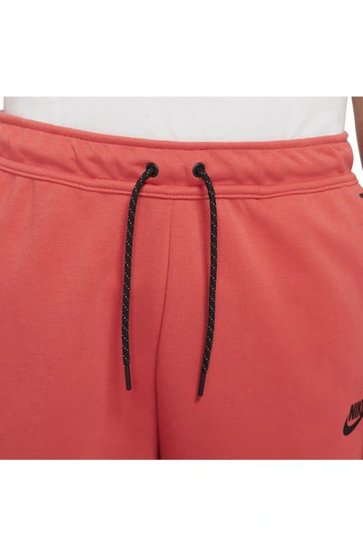 Shop Nike Sportswear Tech Fleece Shorts In Lobster/black