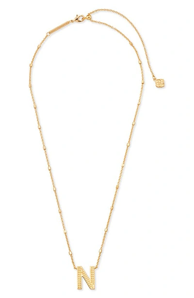 Shop Kendra Scott Initial Pendant Necklace In Gold Metal-n