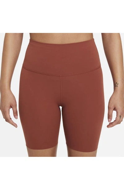 Shop Nike Yoga Luxe Tight Shorts In Redstone/dark Pony