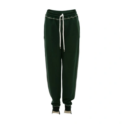 Shop Jw Anderson Tapered Track Pants In Green