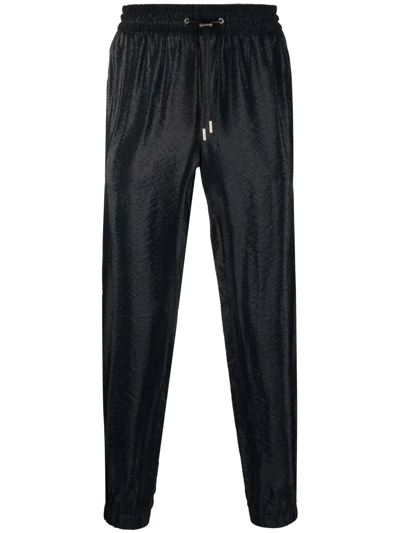Saint Laurent Men's Shiny Side-stripe Track Pants In Schwarz