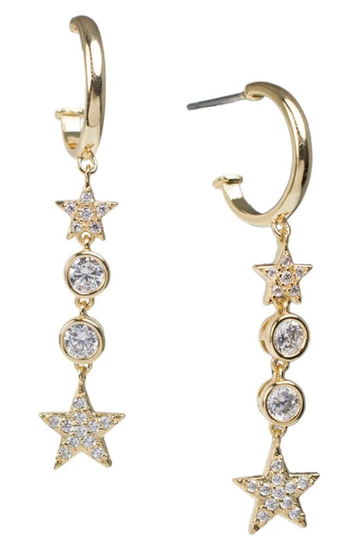 Shop Cz By Kenneth Jay Lane Cz Linear Star Drop Huggie Earrings In Clear/gold
