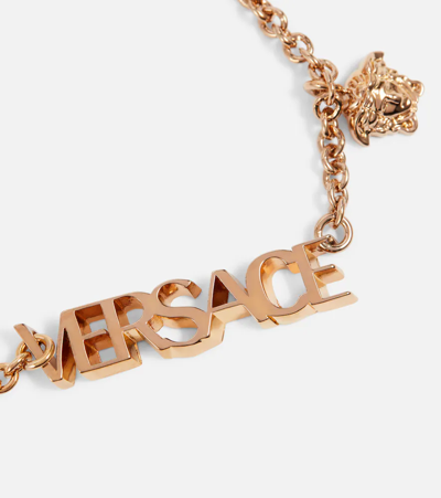 Shop Versace Medusa And Logo Necklace In  Gold