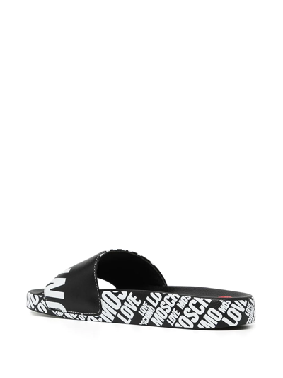 Shop Love Moschino Logo-print Faux-leather Slides In Black