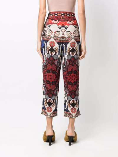 Shop Balmain Abstract Pattern-print Cropped Trousers In Red