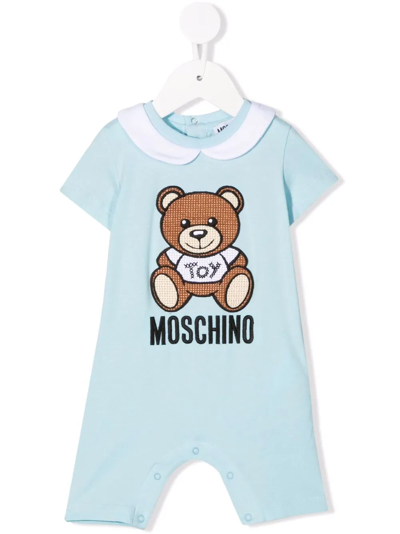 Shop Moschino Logo-embroidered Cotton Romper In Blue