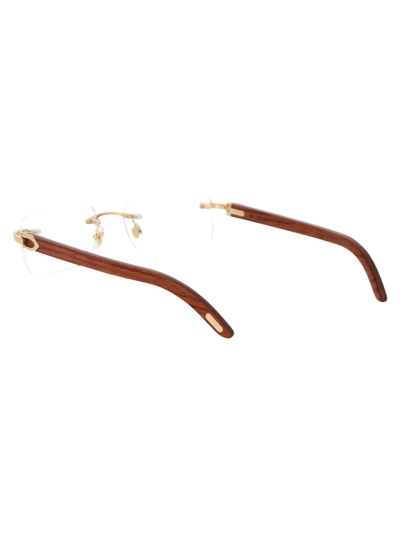 Shop Cartier Ct0052o Glasses In 008 Gold Brown Transparent