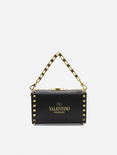 Shop Valentino Rockstud Alcove Leather Clutch In Black