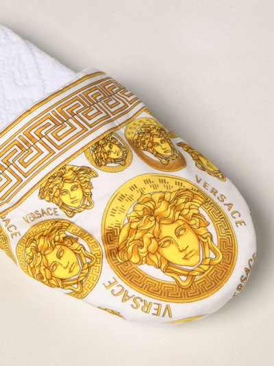 Shop Versace Flat Shoes  Home Slippers With Medusa And Greca Print In White