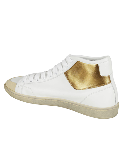 Shop Saint Laurent Sl/39 Mid Top Sneakers In Optic White/gold