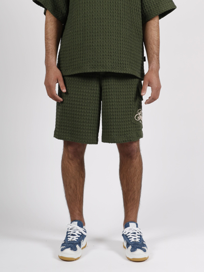 Shop Gcds Embroidered Logo Shorts In Green