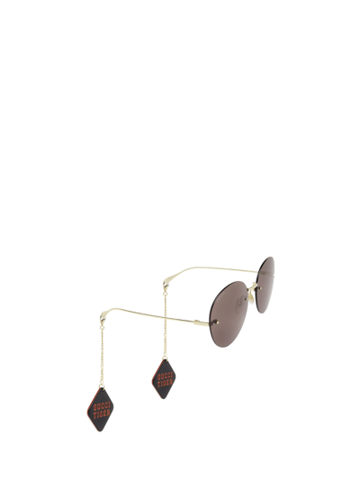 Shop Gucci Gg1149s Gold Sunglasses