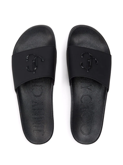 Shop Jimmy Choo Port Monogram-logo Slides In Schwarz