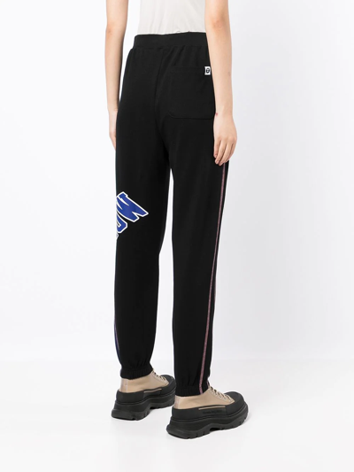 Shop Aape By A Bathing Ape Logo-print Tapered Trousers In Schwarz