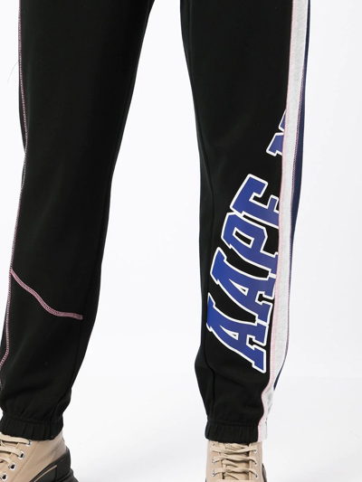 Aape By A Bathing Ape Logo-print Tapered Trousers In Schwarz