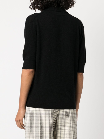 Shop Khaite Jo Shortsleeved Cashmere Polo Top In Schwarz