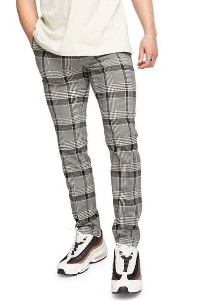 Shop Topman Skinny Check Pants In Navy