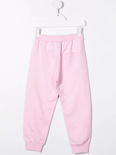 Shop Versace Embellished-logo Track Pants In Pink