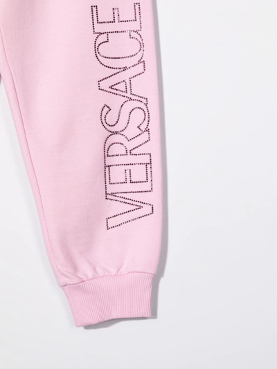 Shop Versace Embellished-logo Track Pants In Pink
