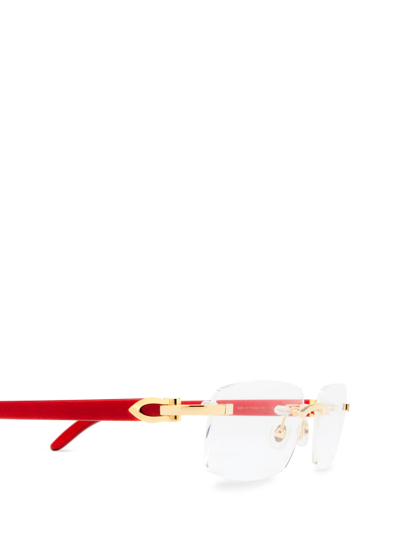 Shop Cartier Eyeglasses In Gold &amp; Red