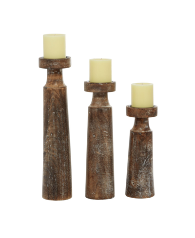 Shop Rosemary Lane Mango Wood Natural Candle Holder, Set Of 3 In Brown