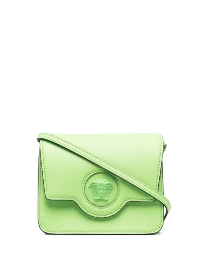 Shop Versace La Medusa Crossbody Bag In Green