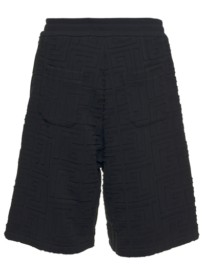 Shop Balmain Cotton Monogram Printed Bermuda Shorts In Black