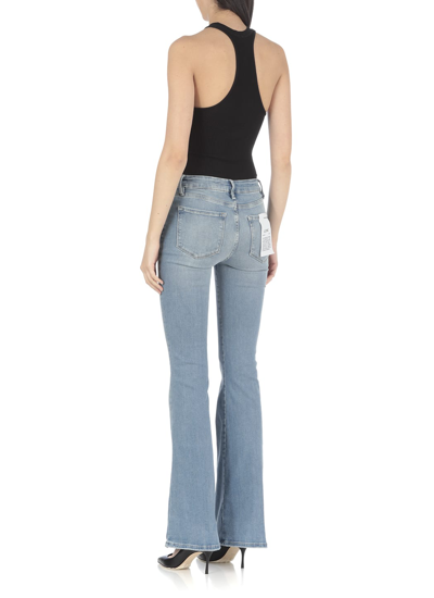 Shop Frame Le One Flare Jeans In Blue