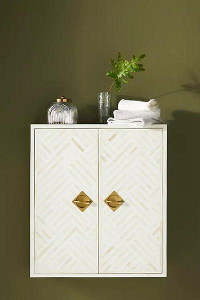 Shop Anthropologie Optical Inlay Wall Cabinet In White
