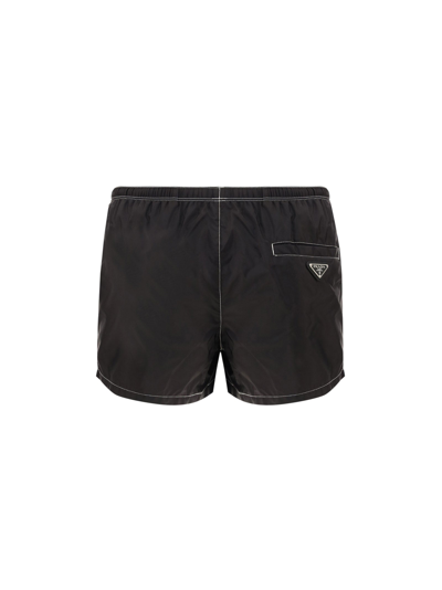 Shop Prada Logo Plaque Swim Shorts In Black