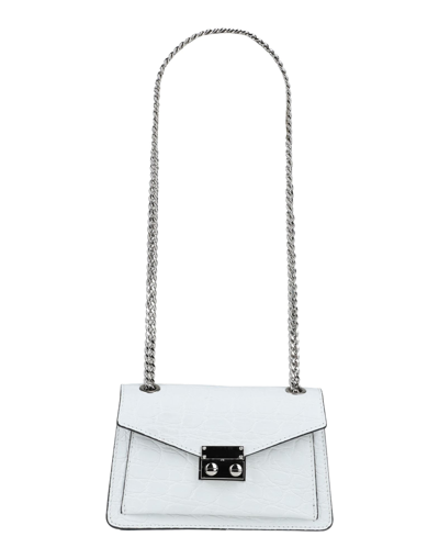 Shop Innue' Handbags In White