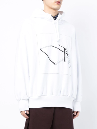 Shop Undercover Graphic Print Drawstring Hoodie In White