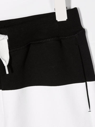 Shop Dsquared2 Nº 5 Print Trousers In Black