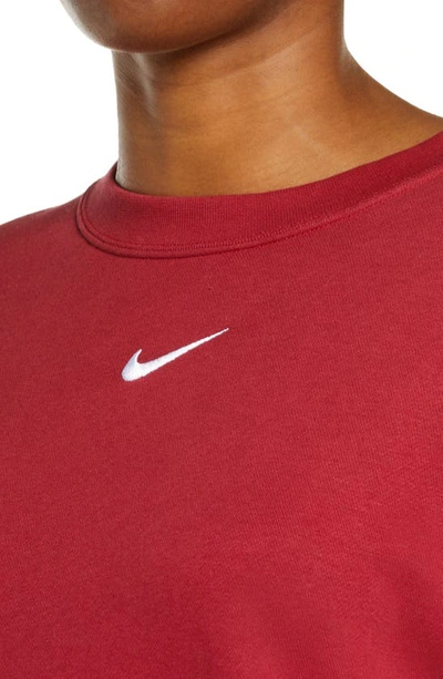 Shop Nike Sportswear Essential Oversize Sweatshirt In Pomegranate/ White