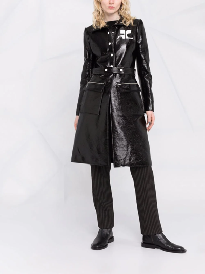 Shop Courrèges Logo-print Lacquered-effect Trench Coat In Black