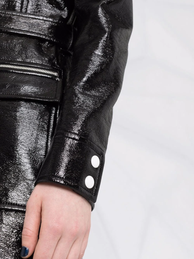 标贴漆光面料外套