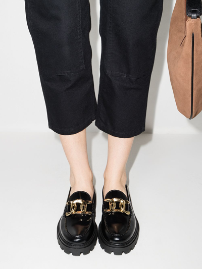 Shop Tod's Chain-detail Leather Loafers In Schwarz