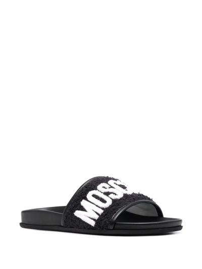 Shop Moschino Logo-lettering Leather Slides In Black