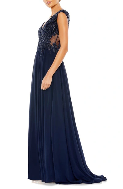 Shop Mac Duggal Sequin Empire Waist Pleated Gown In Navy