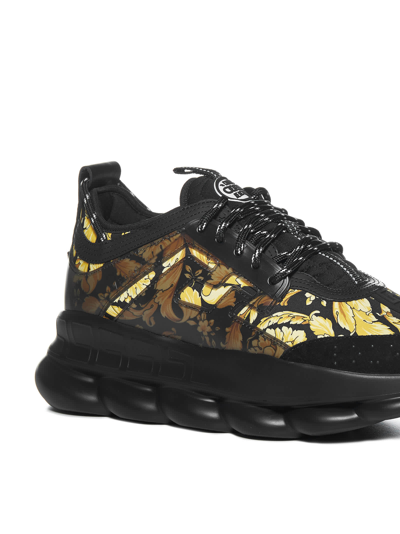 Shop Versace Sneakers In Oro Nero