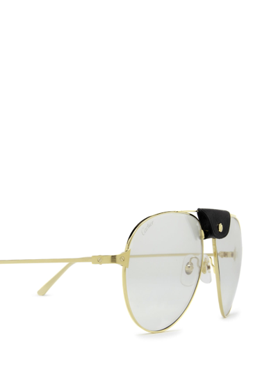 Shop Cartier Ct0038s Gold Sunglasses