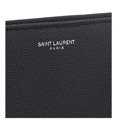 Shop Saint Laurent Pebbled Leather Travel Wallet In Ultramarine
