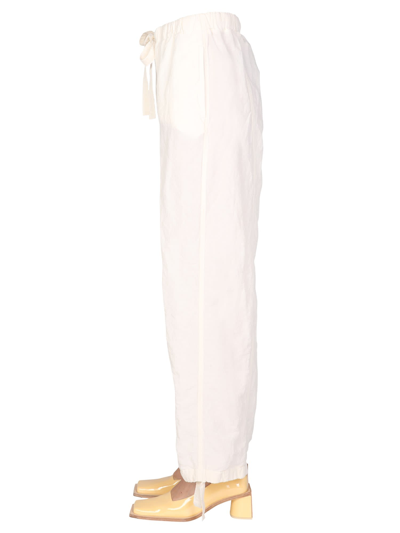 Shop Jil Sander Trousers With Drawstring In Bianco
