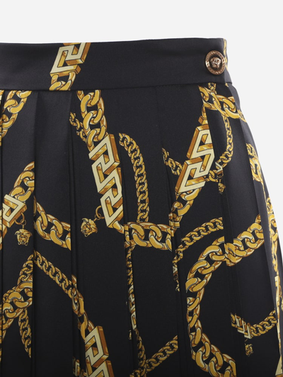 Shop Versace Flared Skirt With All-over Chain Print In Black, Gold